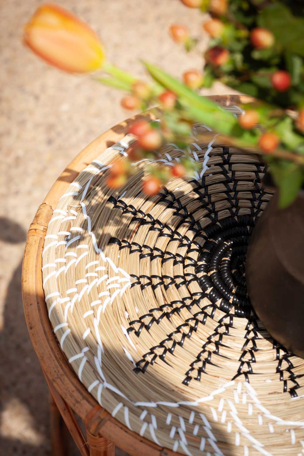 Detail of the Eliette rattan side table.